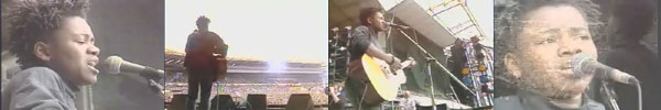 Tracy Chapman performing on stage at the Nelson Mandela 70th Tribute Concert