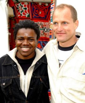 Woody Harrelson and Tracy Chapman backstage at "We the Planet" concert at Speedway Meadow in Golden Gate Park. (Photo by Tim Mosenfelder/Getty Images)