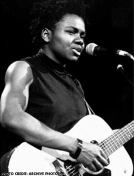 Tracy Chapman performing at the Human Right Now Tour in September 1988, by Archive Photos