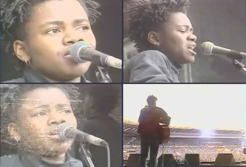 Screenshots of Tracy Chapman's performance at the Nelson Mandela 70th Birthday Concert at Wembley on June 11, 1988